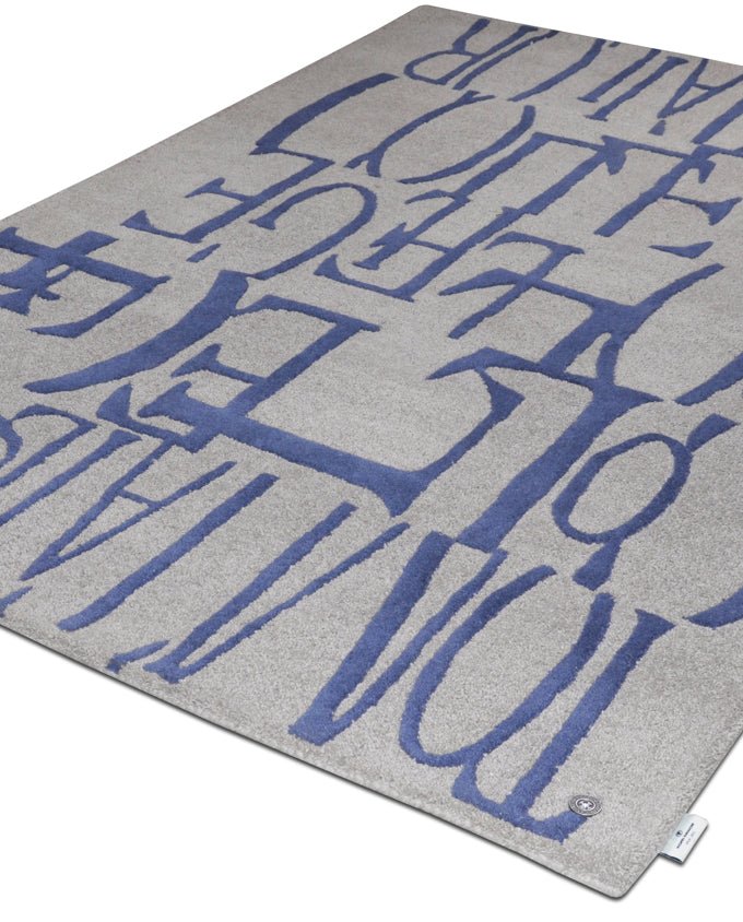 Tom Tailor Home Letters blue kézi tűzött gyapjú szőnyeg - Leguan Exclusive - Tom Tailor -