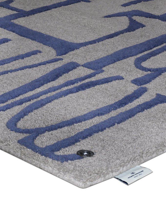 Tom Tailor Home Letters blue kézi tűzött gyapjú szőnyeg - Leguan Exclusive - Tom Tailor -