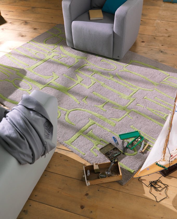 Tom Tailor Home Letters green kézi tűzött gyapjú szőnyeg - Leguan Exclusive - Tom Tailor -