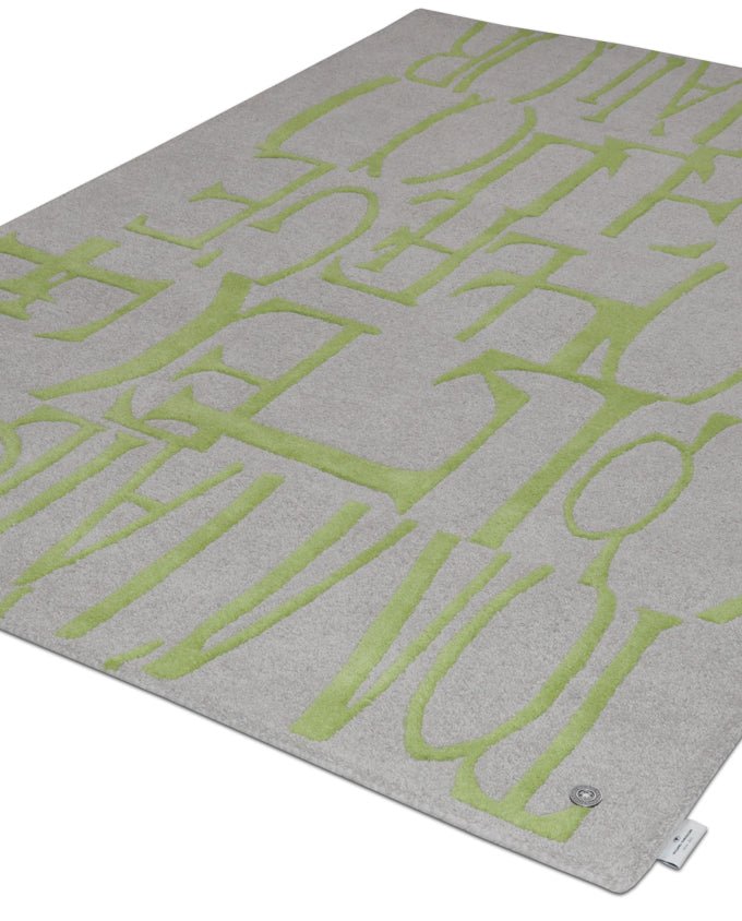 Tom Tailor Home Letters green kézi tűzött gyapjú szőnyeg - Leguan Exclusive - Tom Tailor -